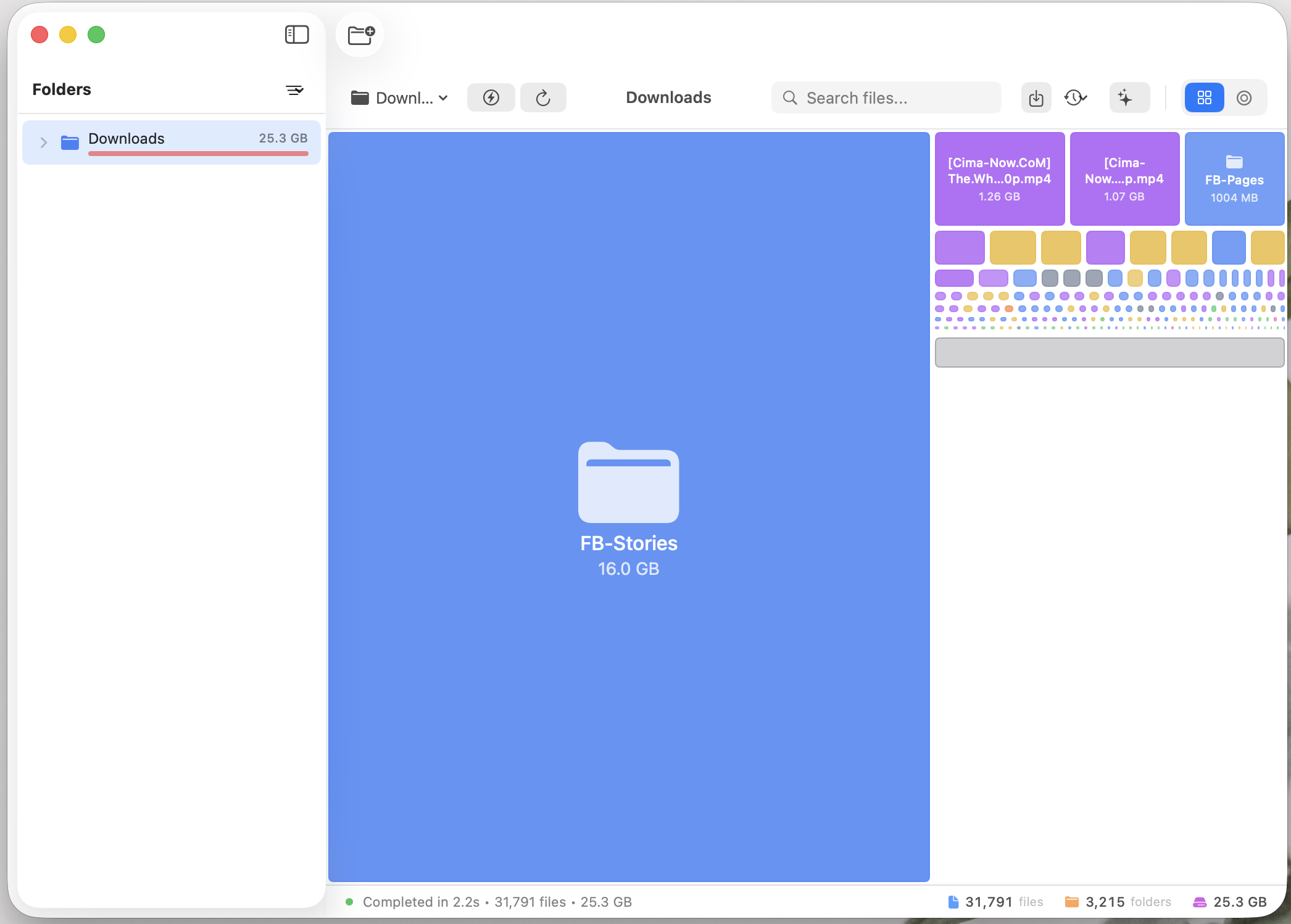 StorageMap macOS application visualizing the Downloads folder as an interactive treemap with file and folder totals